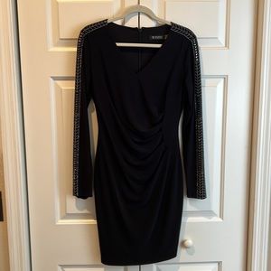 Guess long sleeved dress. Black with silver beading on sleeves.